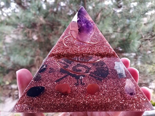 Galactic Butterfly orgone pyramid with red jasper, carnelian and black tourmaline orgonite crystals.