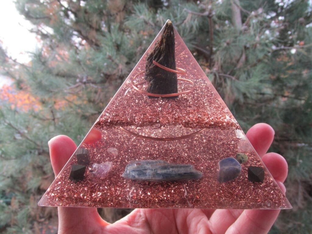 Grounding Orgone energy Pyramid with black kyanite and blue kyanite.