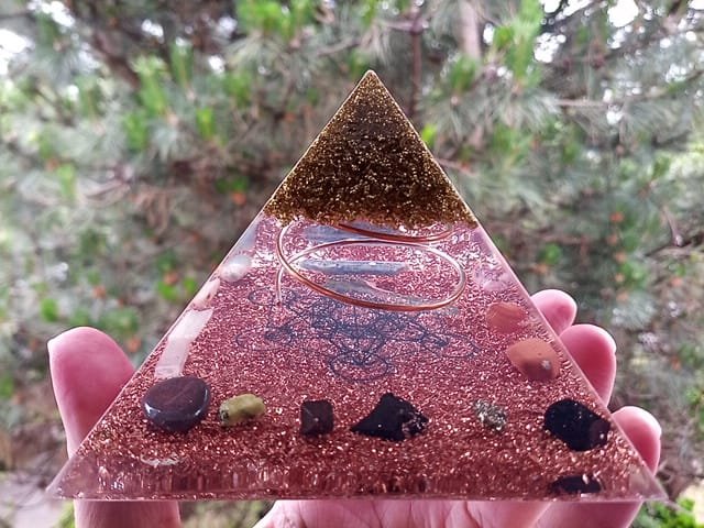 Metatron's Cube Orgone energy Pyramid, with grounding stones black tourmaline and shungite.