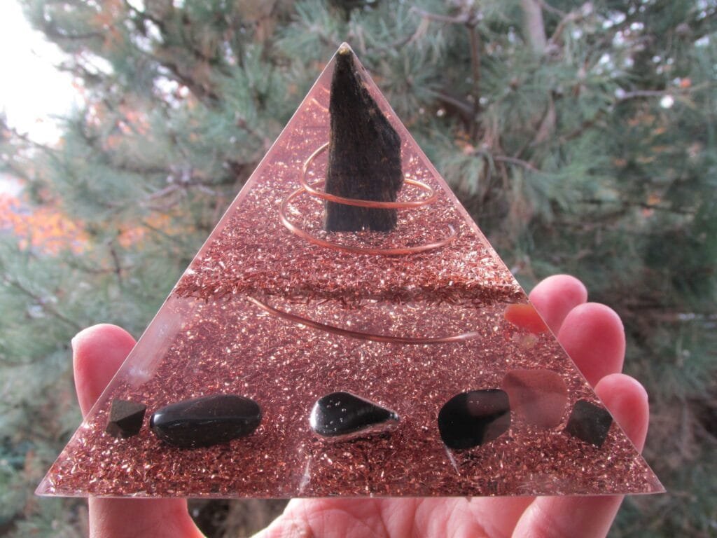 Grounding Orgonite Pyramid with shungite, hematite and black tourmaline.