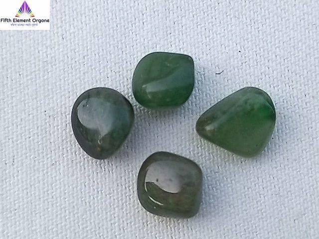 Green Aventurine crystals on a white background