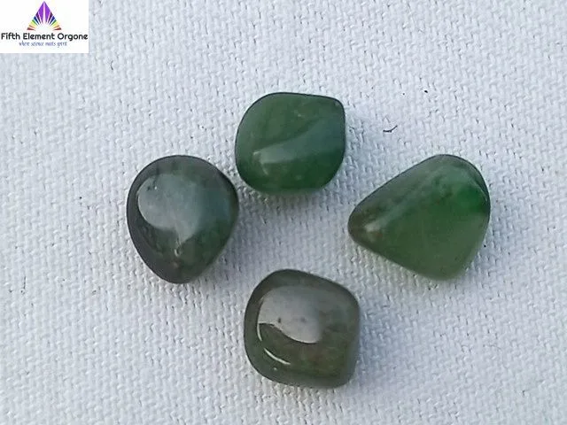 Green Aventurine crystals on a white background