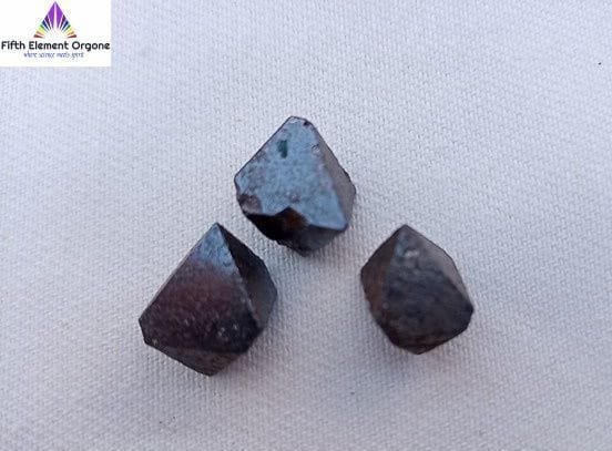Magnetite crystal on a white background