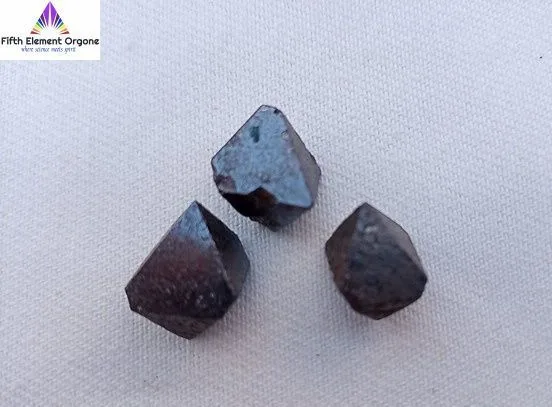 Magnetite crystal on a white background