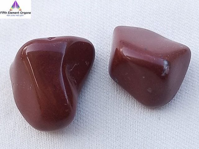 Red Jasper crystal on a white background