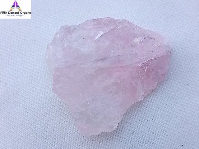 Rose Quartz crystal on a white background