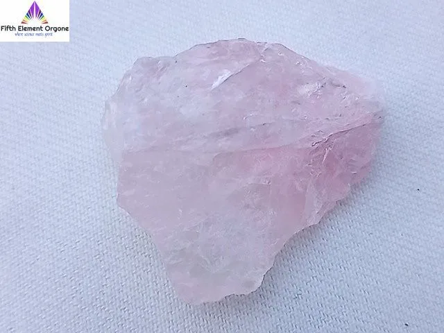 Rose Quartz crystal on a white background