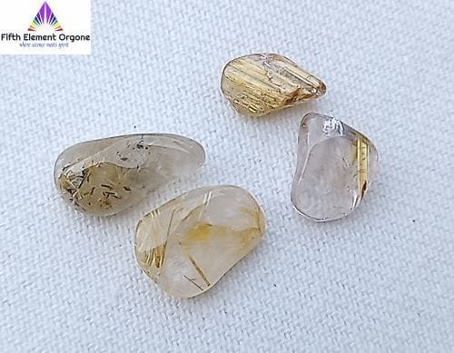Rutilated Quartz crystals on a white background.