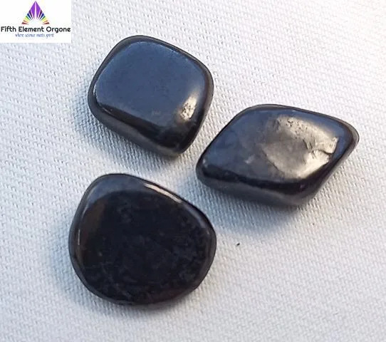 Shungite crystals on a white background.