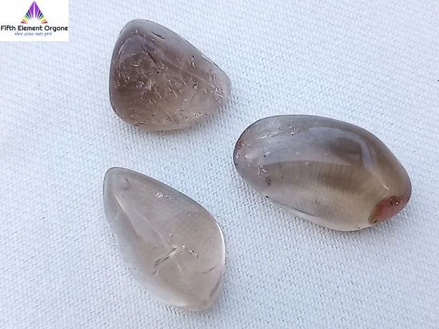 Smoky Quartz crystals on a white background.