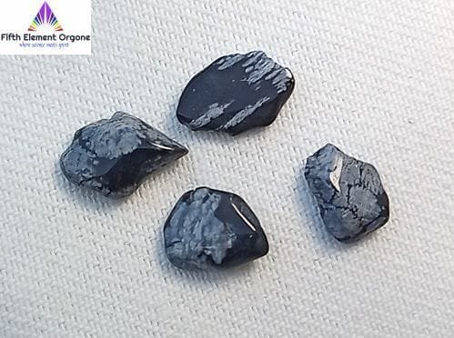 Snowflake Obsidian crystals on a white background