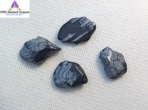 Snowflake Obsidian crystals on a white background