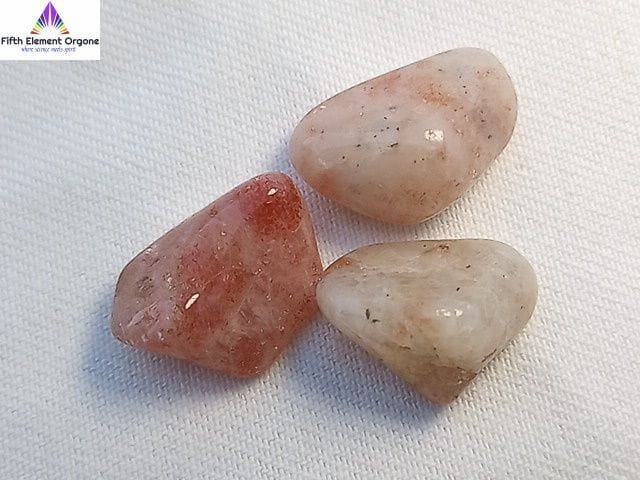 Sunstone crystals on a white background